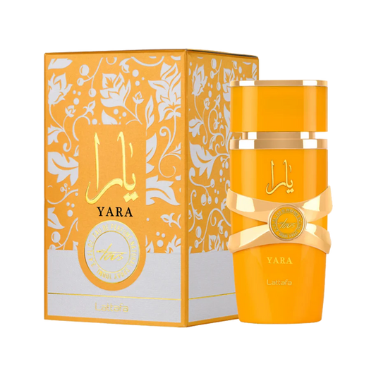 Lattafa Yara Tous Orange perfume bottle and packaging with 'Yara' branding on a white background