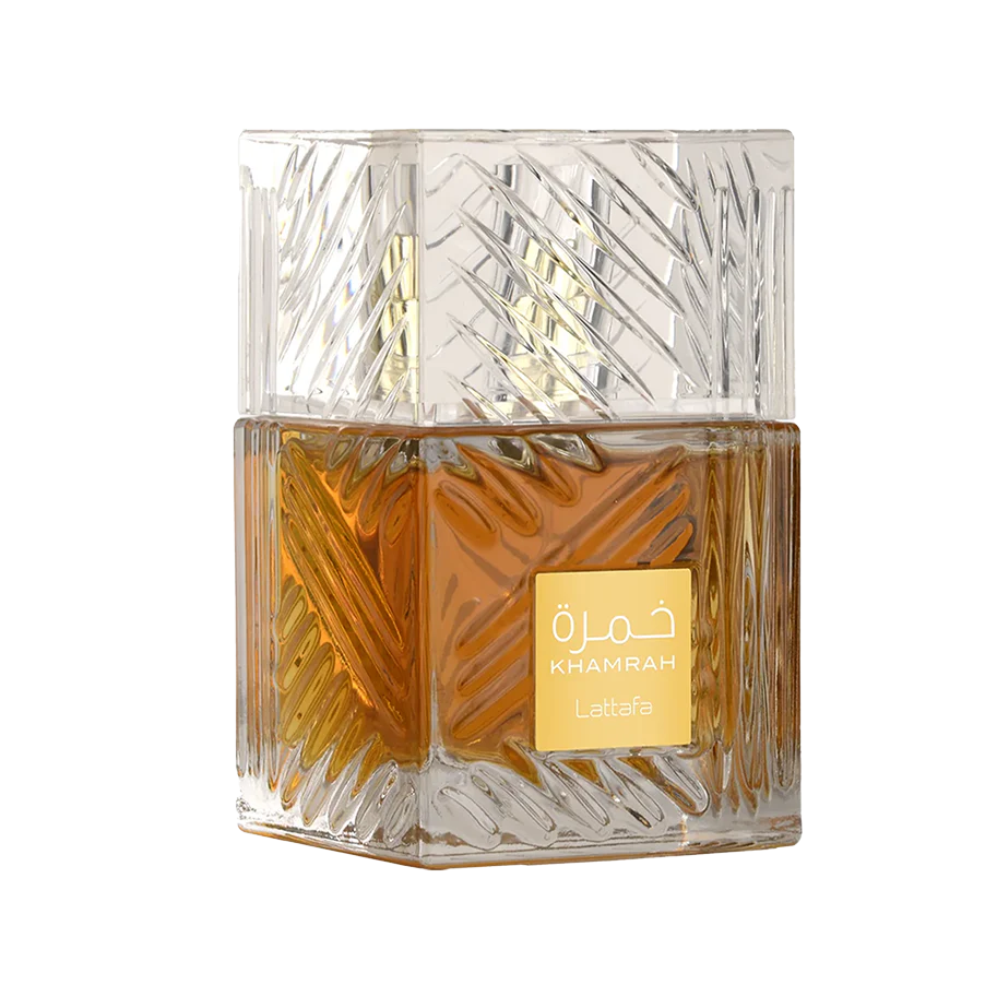 Lattafa Khamrah  perfume bottle with intricate design and gold label on a white background
