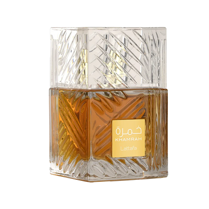 Lattafa Khamrah  perfume bottle with intricate design and gold label on a white background